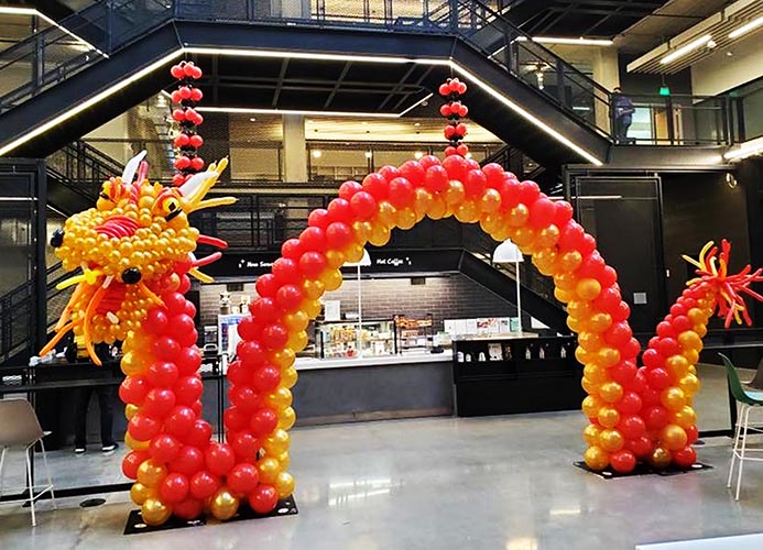 A 20 foot long gold and red balloon sculpture of a dragon for Chinese New Year.
