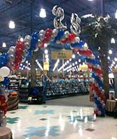 Balloon arch and decorations for a store's 25th anniversary sales event