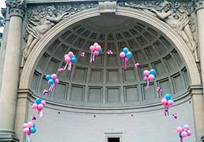 This 80 foot arch of balloon clusters frames a performance in Golden Gate Park in San Francisco