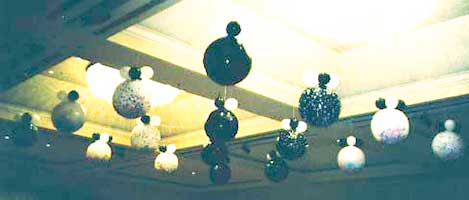 Exploding style balloon drop using 30 inch black and white balloons for the Fairmont Hotel in San Jose