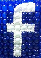 Giant Facebook logo created from balloons for a Facebook corporate party