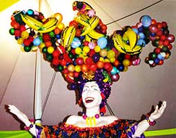  a giant fruit bowl balloon hat for a Carmen Miranda prop at a fund raising event