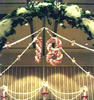 a giant suspended #18 for an 18th birthday celebration at the San Jose Fairmont Hotel